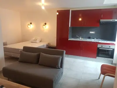 Cuisine ou kitchenette dans l'établissement Studio 30 m2 toutlemonde