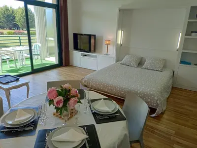Un ou plusieurs lits dans un hébergement de l'établissement Appartement de standing dans le Golf International de La Baule