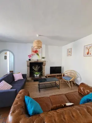 Coin salon dans l'établissement La maison d'Eglantine, 6 min du Puy du Fou, 4 chambres 10 couchages à St Malo-du-Bois,