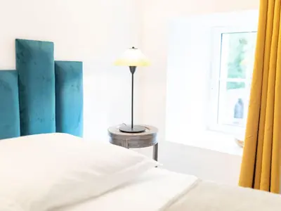 Un ou plusieurs lits dans un hébergement de l'établissement Studio 2 pers rénové en bord de Sèvre avec cuisine équipée et extérieur partagé - FR-1-426-482