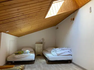 Un ou plusieurs lits dans un hébergement de l'établissement Maison dans les dunes