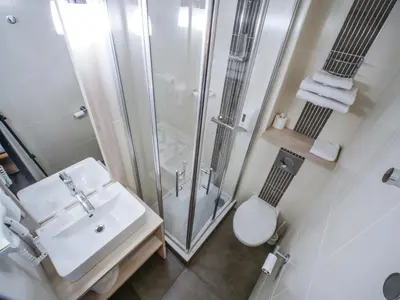 Salle de bains dans l'établissement Hôtel Inn Design & Restaurant Challans