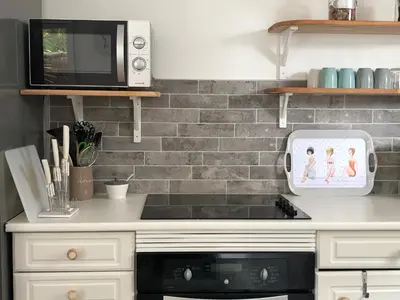 Cuisine ou kitchenette dans l'établissement Bel appartement en rez-de-jardin à 100m des plages