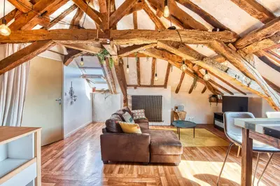 Coin salon dans l'établissement Sous les toits vue LOIRE