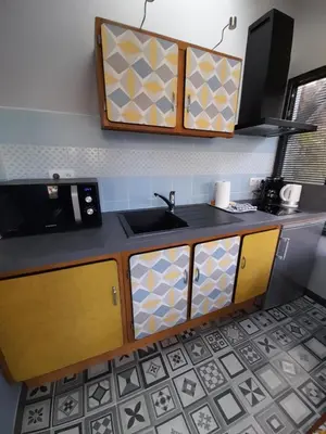 Cuisine ou kitchenette dans l'établissement L'Inattendu