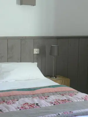 Un ou plusieurs lits dans un hébergement de l'établissement L'Île Ô Château