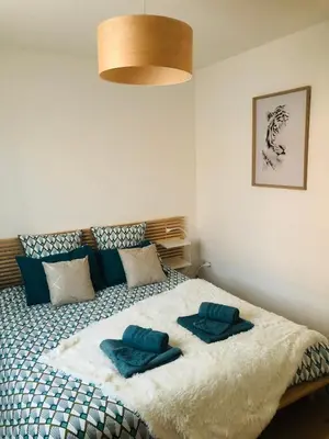 Un ou plusieurs lits dans un hébergement de l'établissement Maison La Baliere,2 chambres,5 personnes, à 20 minutes du Puy du Fou
