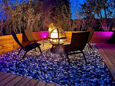 Jardin de l'établissement Lincontournable - Jaccuzi-Piscine-Sauna-Hammam