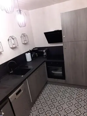 Cuisine ou kitchenette dans l'établissement GÎTE BARBE BLEUE