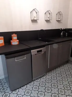 Cuisine ou kitchenette dans l'établissement GÎTE BARBE BLEUE