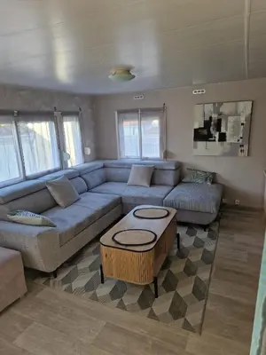 Coin salon dans l'établissement Mobilhome spacieux