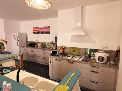 Cuisine ou kitchenette dans l'établissement Le Moulin Jodet