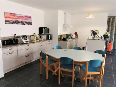 Cuisine ou kitchenette dans l'établissement Le Moulin Jodet