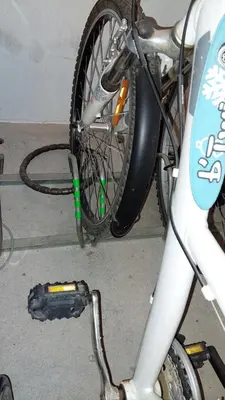 Vélo sur le terrain de l'établissement Appartement T2 vue mer les pieds dans l'eau avec parking privé ou dans les environs