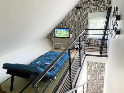 Un ou plusieurs lits dans un hébergement de l'établissement Duplex face mer tout confort sur la plage /tennis