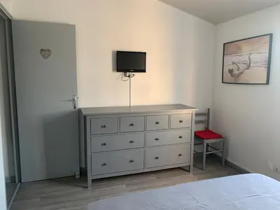 Un ou plusieurs lits dans un hébergement de l'établissement Appartement vue mer