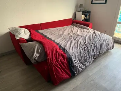 Un ou plusieurs lits dans un hébergement de l'établissement Appartement vue mer