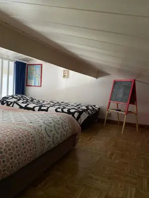 Un ou plusieurs lits dans un hébergement de l'établissement Appartement vue mer