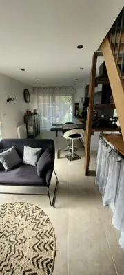 Coin salon dans l'établissement Le 6 bis avec Jardinet