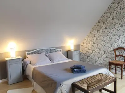 Un ou plusieurs lits dans un hébergement de l'établissement Jolie maison en pierre avec jardin privatif, proche de la Loire et des châteaux, animaux bienvenus - FR-1-622-23