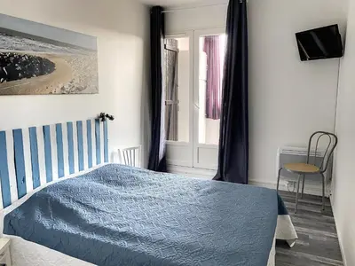 Un ou plusieurs lits dans un hébergement de l'établissement Appartement Familial Proche Plage et Forêt avec Parking Privé - FR-1-652-4
