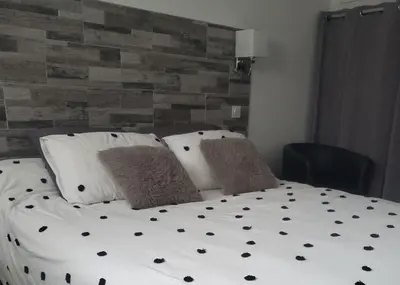 Un ou plusieurs lits dans un hébergement de l'établissement Cale 32 - Chambres d'hôtes