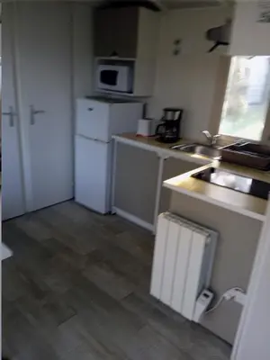 Cuisine ou kitchenette dans l'établissement Camping Onlycamp du Moulin