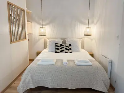 Un ou plusieurs lits dans un hébergement de l'établissement COZYMAINE, superbe studio au coeur d'Angers