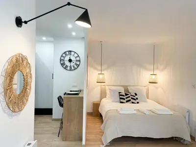 Un ou plusieurs lits dans un hébergement de l'établissement COZYMAINE, superbe studio au coeur d'Angers