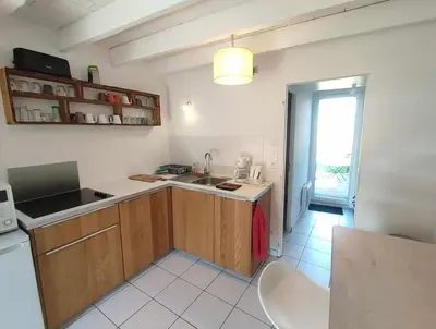 Cuisine ou kitchenette dans l'établissement Mini-loft