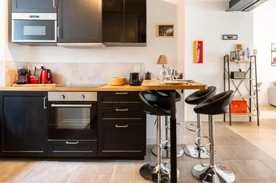 Cuisine ou kitchenette dans l'établissement Armstrong - Charmant logement au coeur de Nantes