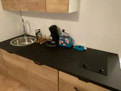 Cuisine ou kitchenette dans l'établissement Hébergements indépendants proches aéroport de Nantes Atlantique et centre ville de Nantes