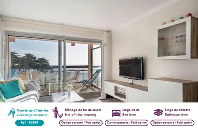 Télévision ou salle de divertissement dans l'établissement Face Mer appartement pour 4 personnes