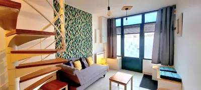 Coin salon dans l'établissement Appartement Samuel centre ville Les Herbiers, 10 min du Puy du Fou