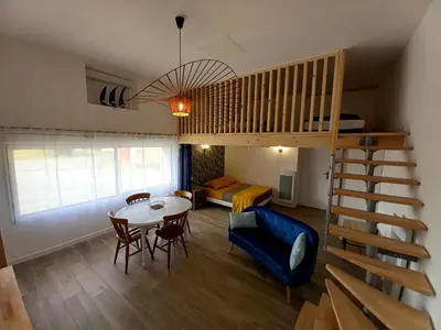 Coin salon dans l'établissement Gîte 'Chez Joseph et Cie' -8 mn du Puy du Fou