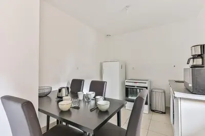 Cuisine ou kitchenette dans l'établissement Le Remblai - 50m de la plage - Terrasse