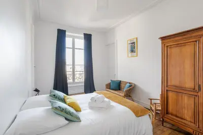 Un ou plusieurs lits dans un hébergement de l'établissement Le Saint-Clément - Quartier Historique- Spacieux 2 chambres rue du Marechal Joffre