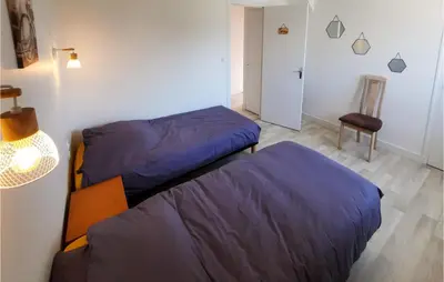 Un ou plusieurs lits dans un hébergement de l'établissement Amazing Home In Allaire With Wifi