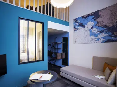 Coin salon dans l'établissement ibis Styles Saint Nazaire Centre Gare