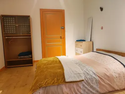 Un ou plusieurs lits dans un hébergement de l'établissement Chambre chez l'habitante 