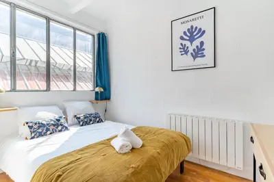 Un ou plusieurs lits dans un hébergement de l'établissement NOCNOC - Loft L'Atelier T5 de 130m2 Proche Centre