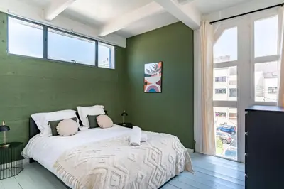 Un ou plusieurs lits dans un hébergement de l'établissement NOCNOC - Loft L'Atelier T5 de 130m2 Proche Centre