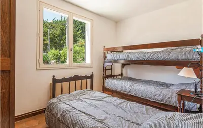 Un ou plusieurs lits dans un hébergement de l'établissement Holiday Home Les Moutiers En Retz Rue De Bois Millet