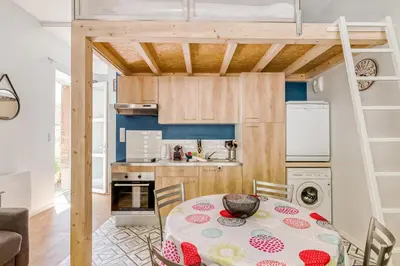 Cuisine ou kitchenette dans l'établissement MOANA - Petit cocon situé quartier République