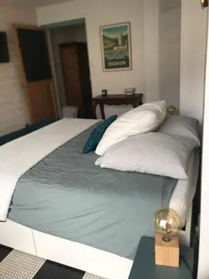 Un ou plusieurs lits dans un hébergement de l'établissement Dans la loge de Marguerite Studio avec Sauna