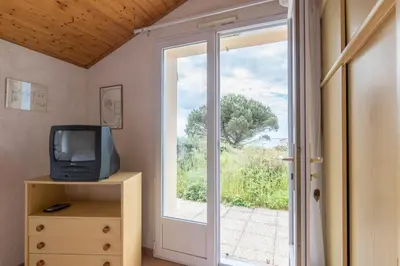 Télévision ou salle de divertissement dans l'établissement L'Horizon - Vue mer - Parking - Jardin
