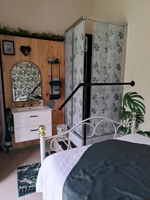 Un ou plusieurs lits dans un hébergement de l'établissement Chez Martine et Bernard -Etablissement définitivement fermé -