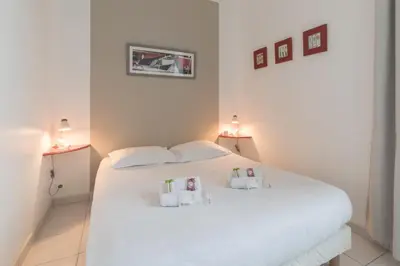 Un ou plusieurs lits dans un hébergement de l'établissement La Birochère - 400 m plage - Parking