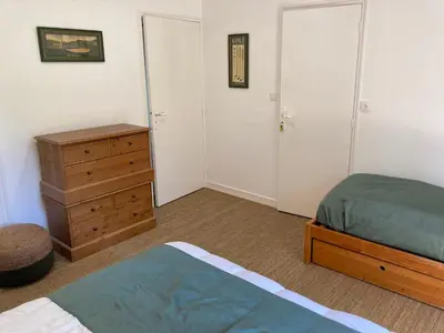 Un ou plusieurs lits dans un hébergement de l'établissement Cottage sur le Domaine du golf de la Bretesche