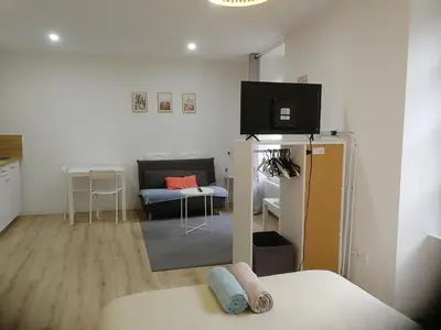 Télévision ou salle de divertissement dans l'établissement Studio Cosy Hyper centre - Fibre - Netflix